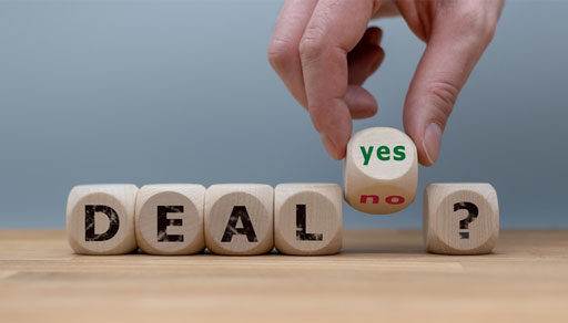 What are the tax implications of buying or selling a business?